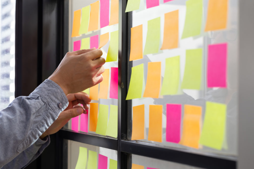 Sticky notes on a project management board scrum 