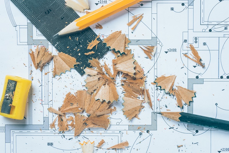 floor-plan-drawing-with-pencil-and-ruler-on-paper