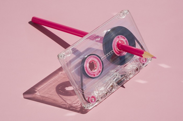 old-fashion-music-cassette-with-pencil-in-it